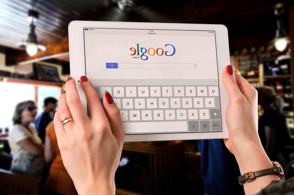 Various notes displayed on laptop and tablets