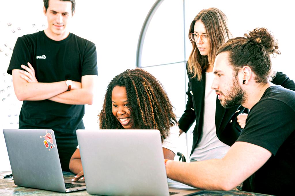 Team working together on digital devices